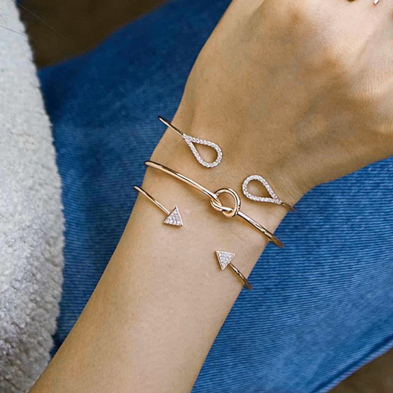 A woman's wrist with three Maramalive™ bracelets on it.