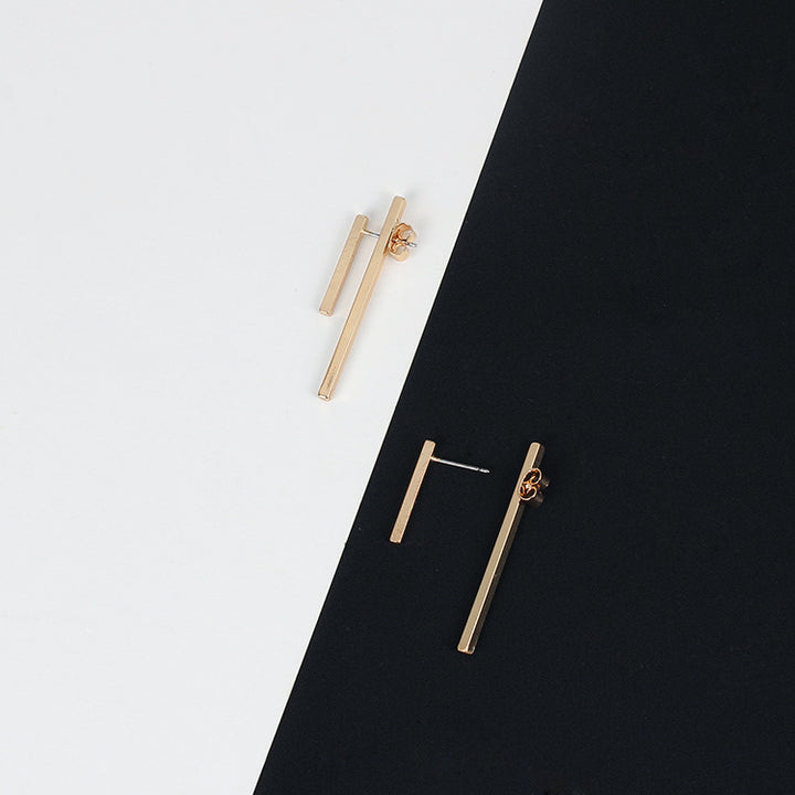 A pair of Minimalism Gold Silver Punk Simple Bar Earrings For Women Geometry Ear Earrings Fine Jewelry by Maramalive™ on a black and white background.