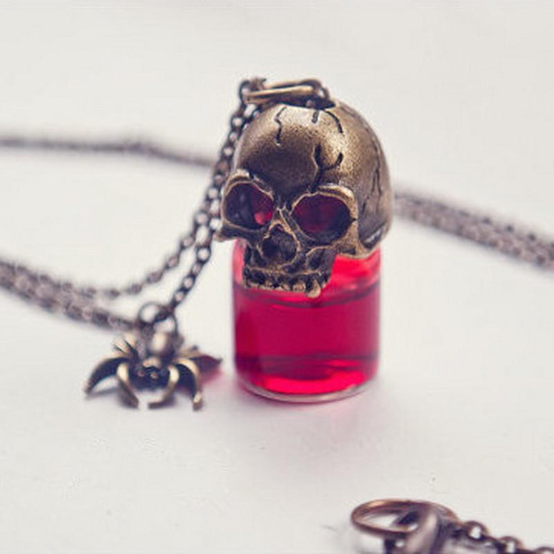A red Skull Blood Bottle Necklace with the Maramalive™ logo, featuring a skull and spider design.