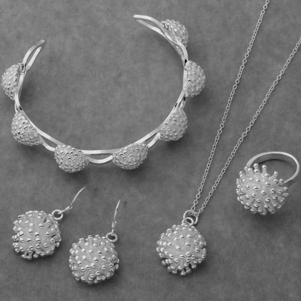 A set of Maramalive™ Gorgeous Bracelet pendant necklace ring earring four piece set.