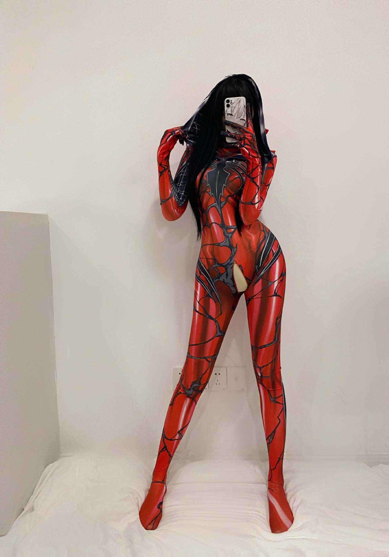 A woman in a Maramalive™ Halloween Cosplay Costume Female Zipper Crotch Sexy Lingerie Bodysuit posing on a bed.