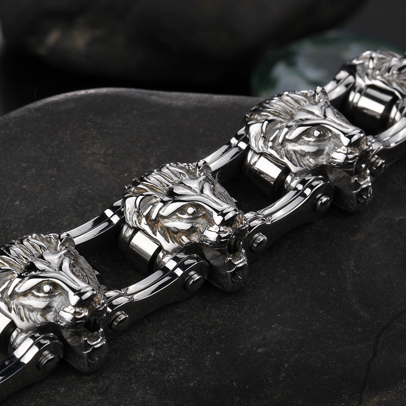 A "Roaring Elegance: Titanium Steel Lion Head Bracelet" with skulls on it from Maramalive™.