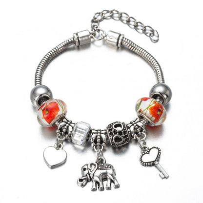 A set of Elephant Charm Bracelets with different charms and charms by Maramalive™.