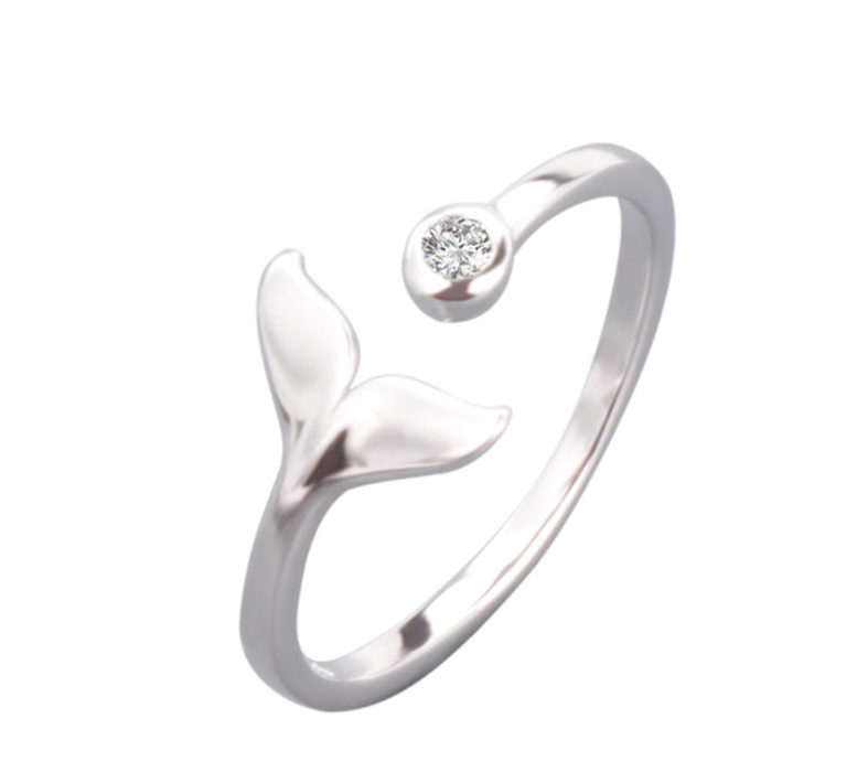 A Stylish zircon mermaid ring with a whale tail on it by Maramalive™.