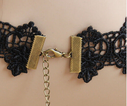 A Vintage Black Lace Necklace - Victorian Gothic Glamour Choker by Maramalive™ with a Victorian design.