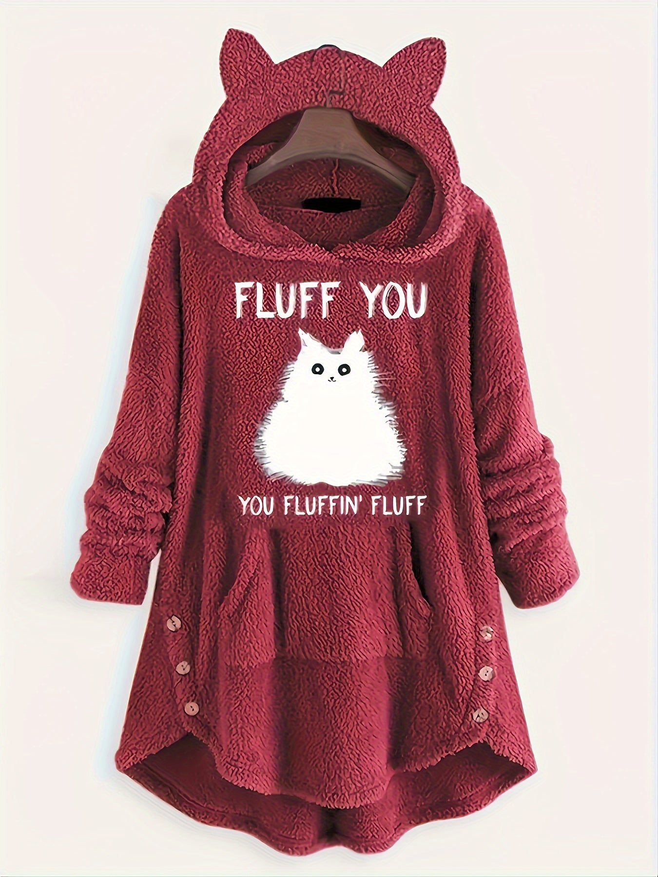 A Maramalive™ Plus Size Casual Sweatshirt, Women's Plus Slogan & Cat Print Fleece Button Decor Long Sleeve Cat Ear Button Decor Sweatshirt With Pockets. This casual pullover features the text "FLUFF YOU YOU FLUFFIN' FLUFF" printed above and below the adorable cartoon pattern.
