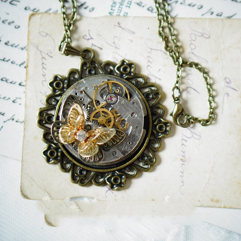 A Vintage Steampunk Butterfly Pendant Necklace Gift by Maramalive™ in a box.