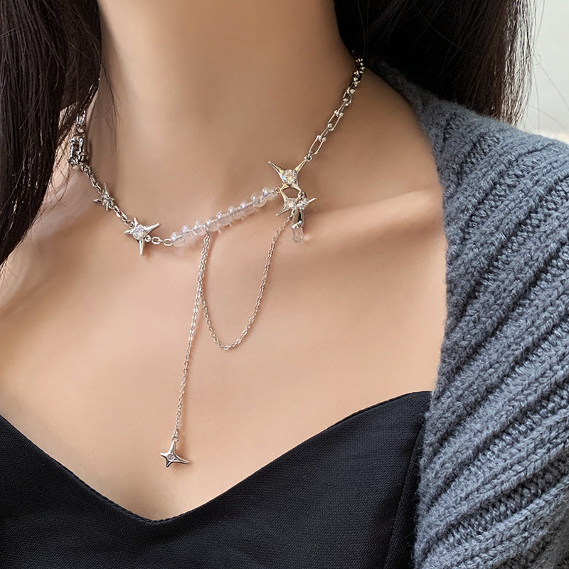 A woman wearing a Maramalive™ Diamond Star Awn Water Drop Pendant Clavicle Necklace Fashion charm.