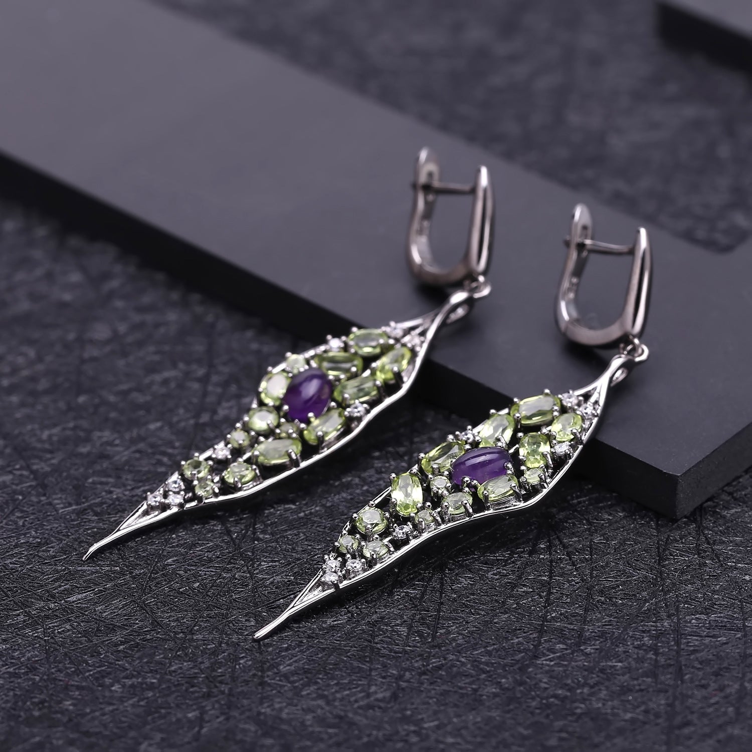 A pair of Maramalive™ earrings with the Jewelry Design 925 Silver Personalized Jewelry Ring Amethyst Peridot stones.
