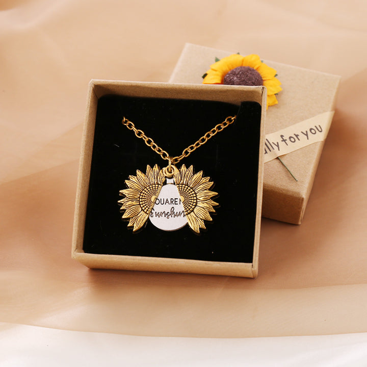 A You Are My Sunshine Sunflower Necklace Women Men with the brand name Maramalive™, featuring a sunflower and the words 'you are a sunflower'.