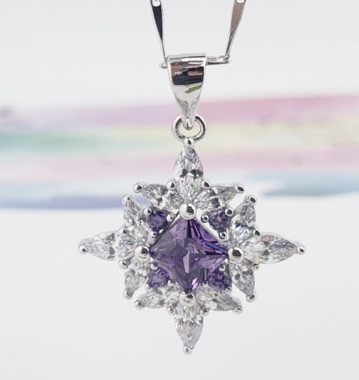 A purple Maramalive™ amethyst and sterling silver jewelry set with white diamonds.