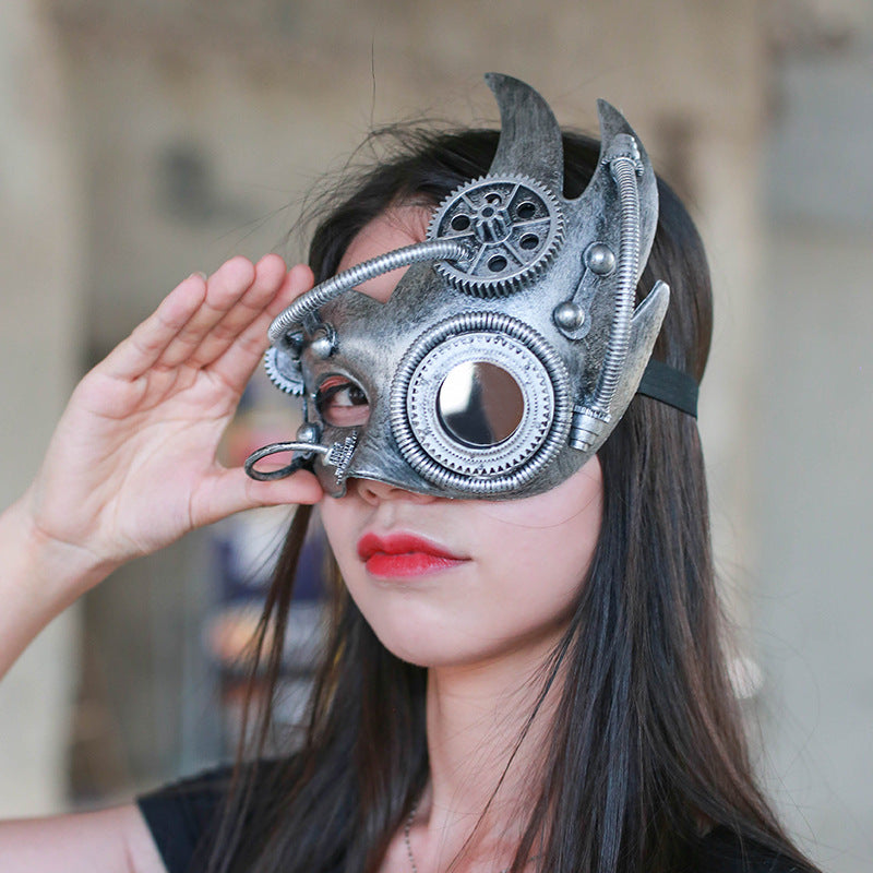 A woman in a black shirt holding a Maramalive™ Mechanical Steampunk Retro Half Face Mask.