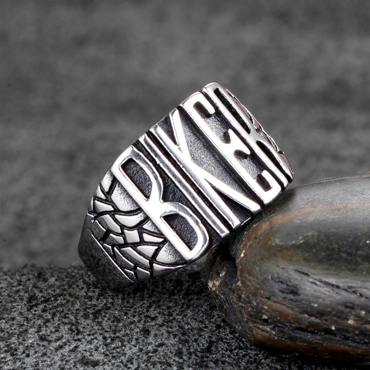 A Speeding Party Punk Men's Biker Ring with the word bike on it, by Maramalive™.