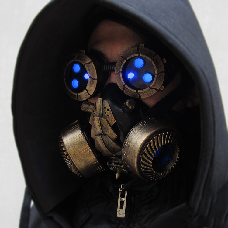A man wearing a Maramalive™ BadBoyStudio steampunk glasses cyber glow mask gas mask with glowing blue eyes.