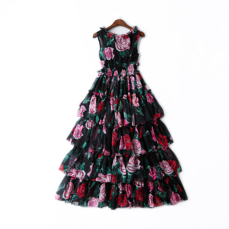 A black and pink Rose print princess dress by Maramalive™ hangs on a hanger.