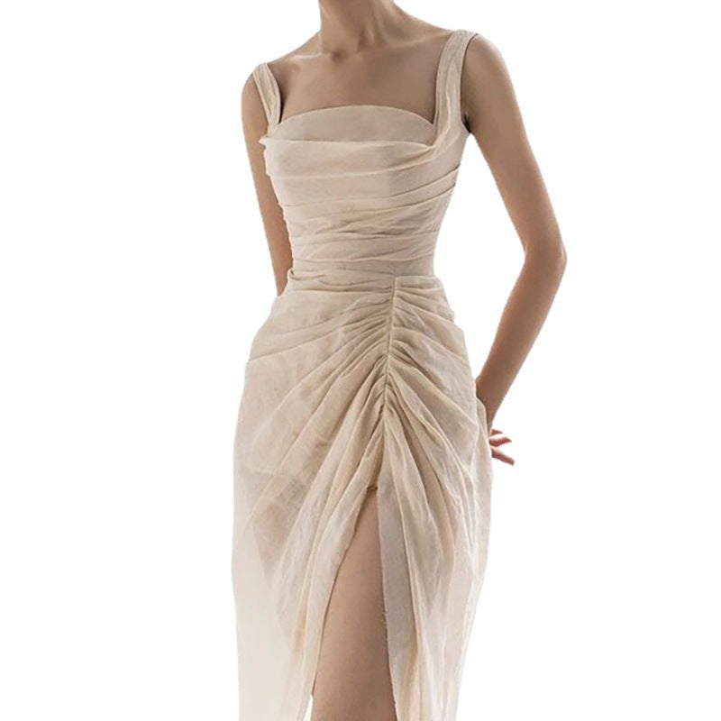 The model is wearing a sexy beige Temperament Suspender Skirt Slit Dress Waist made of polyester fiber brand, Maramalive™.