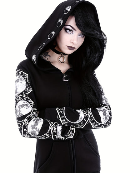 A person with dark hair stands with crossed arms, donning a Maramalive™ Black & White Moon Hoodie, Large Hooded Zip Up Front Pocket Sweater, Gothic Casual Tops, Women's Clothing adorned with moon phases and pentagrams, exuding Gothic fashion.