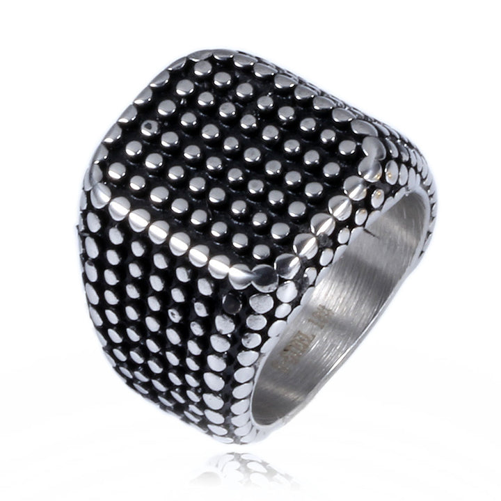 A Titanium Punk Biker Men's Club Ring with black dots on it from Maramalive™.