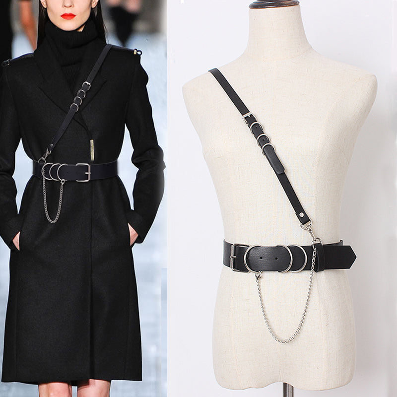 A mannequin wearing a black coat and the Punk Belt by Maramalive™.