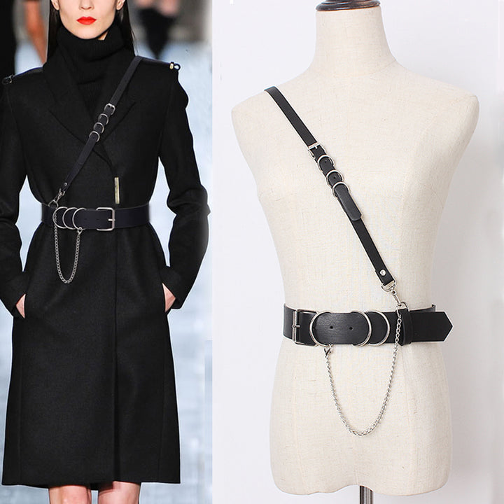 A mannequin wearing a black coat and the Punk Belt by Maramalive™.