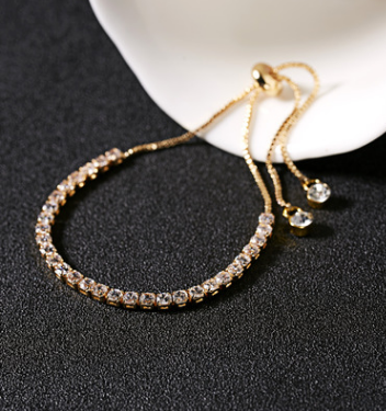 A Crystal Rhinestone Bangle Bracelet for Women - Elegant Wedding or Party Gift by Maramalive™ with diamonds on a black background.