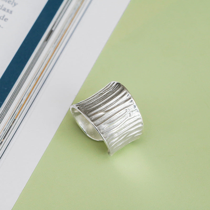 A Wide Irregular Ring with a textured surface by Maramalive™.