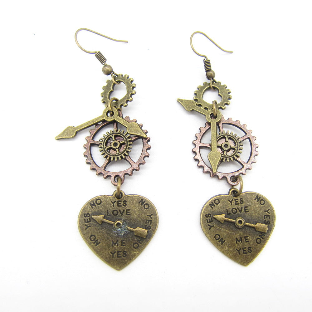 A pair of Maramalive™ Steampunk Heart Earrings with a heart and gears on them.