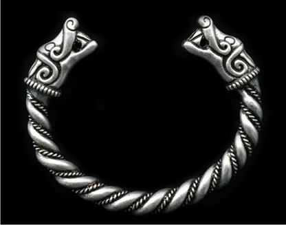 A Dragon Twisted Bracelet with a viking head on it by Maramalive™.