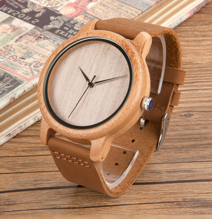 A Bamboo Wooden Watch by Maramalive™ in a box with a pink rose.