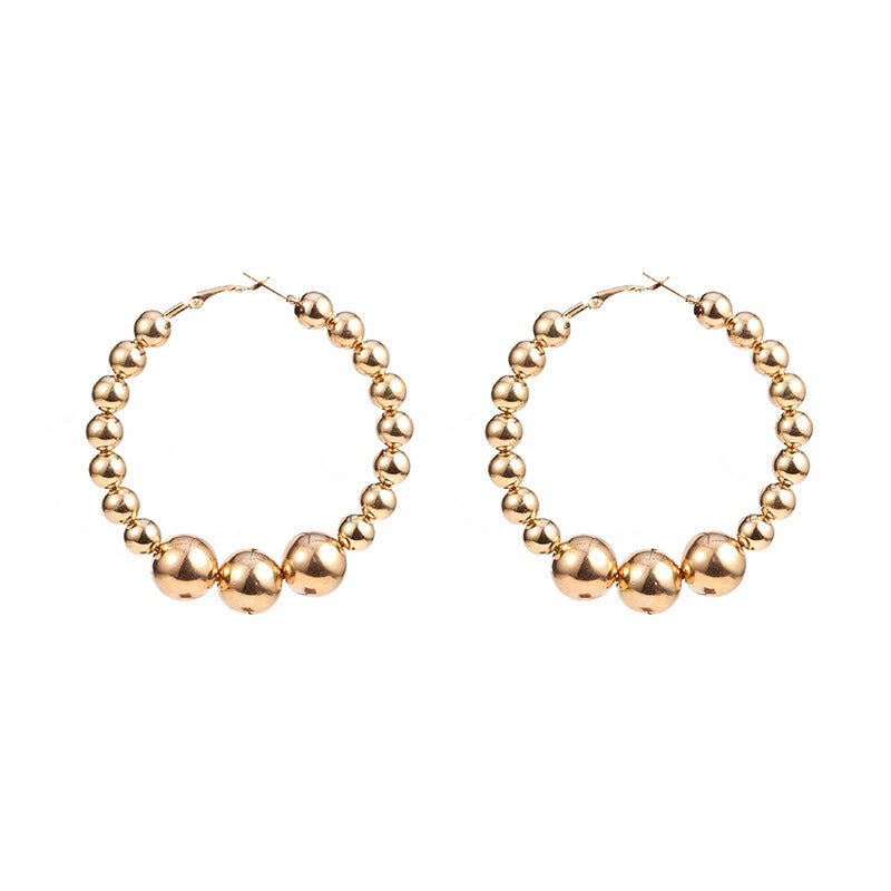 A pair of Minimalist Alloy hoop earrings by Maramalive™.