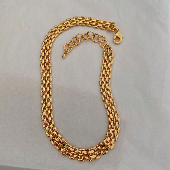 A women's Vintage Gate chain bracelet and Necklace as a travel souvenir on a piece of paper from Maramalive™.