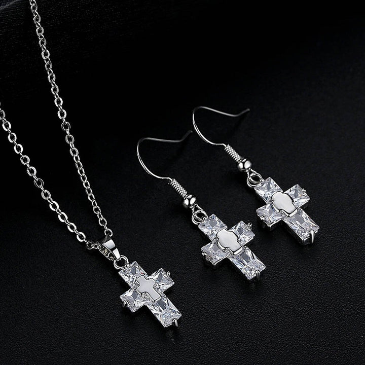 An Inspirational Statement Cross Pendant and Earring set in rose gold by Maramalive™.