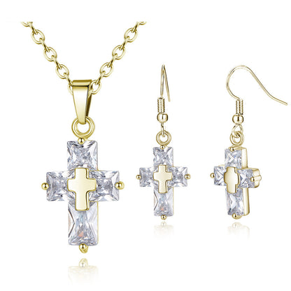 An Inspirational Statement Cross Pendant and Earring set in rose gold by Maramalive™.