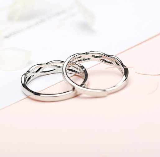 A pair of Couple ring Beautiful Stand Out design interlocking forever with twisted designs by Maramalive™.