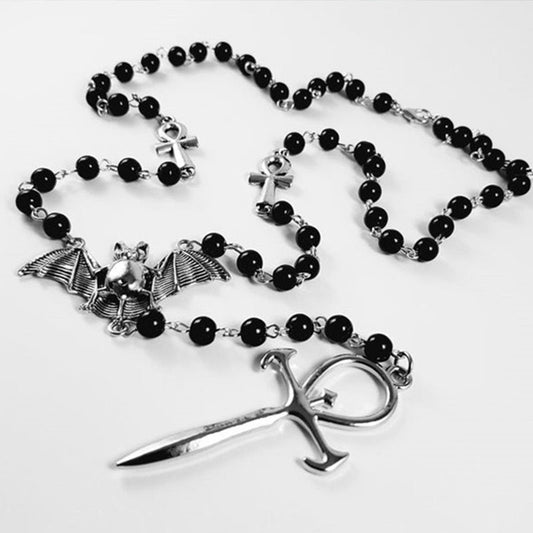 An Maramalive™ Metal Ankh Pendant Necklace Mysterious Gothic with a bat and knife on it, popular in European and American fashion.