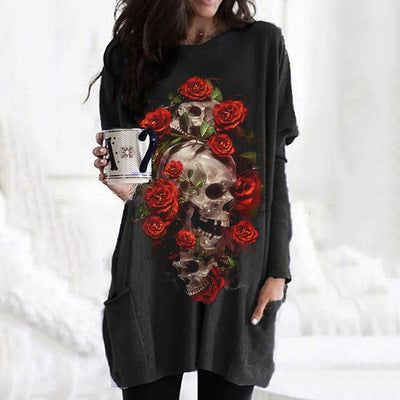 A woman wearing a gray dress with the Maramalive™ Halloween Skull Rose Print Pattern Long Sleeve on it.