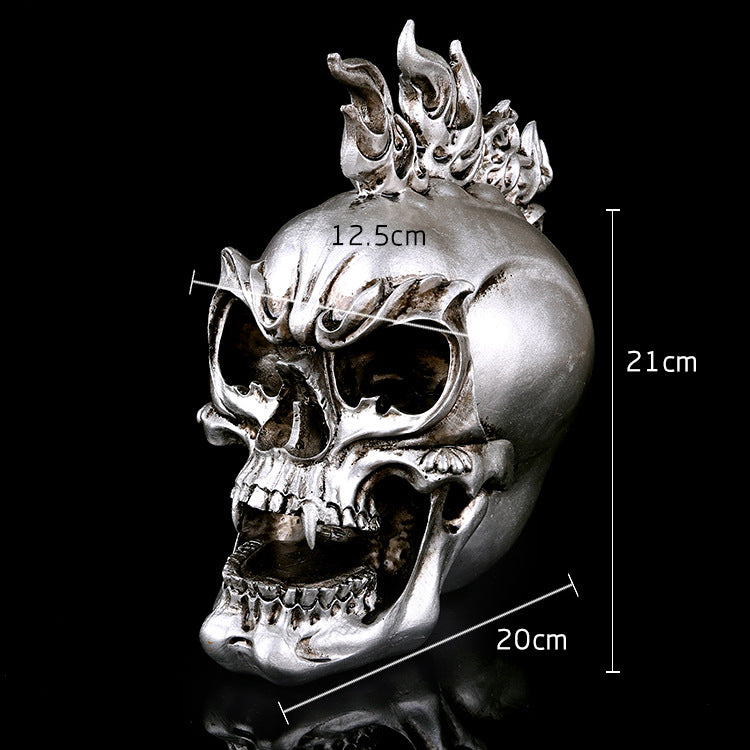 A SILVER RESIN SKULL Head Figure Ornament Occult Skeleton GOTHIC PUNK Decor with flames on it from the brand Maramalive™.