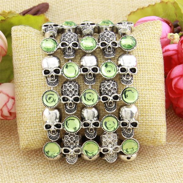 A Maramalive™ Unusual Skull skeleton stretch bracelet for women biker bling jewelry antique gold silver plated with crystals and flowers.