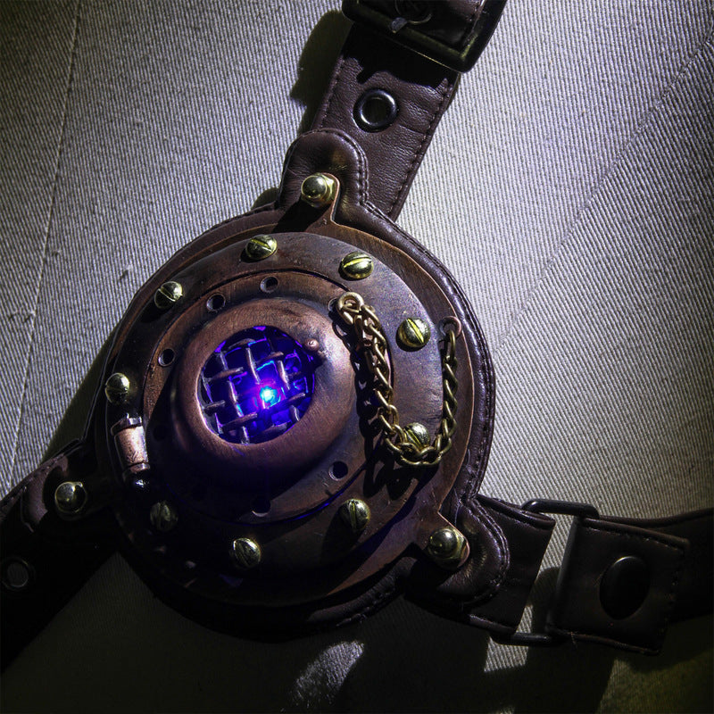 A Maramalive™ Steampunk chest buckle with a brown leather strap.