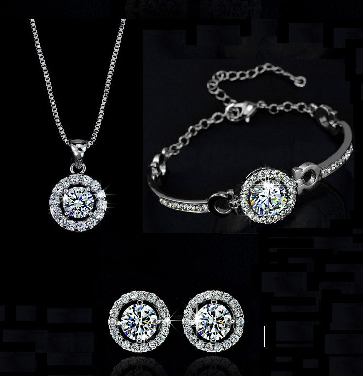 A Maramalive™ jewelry set including a necklace, earrings and ring.