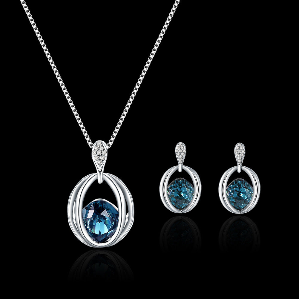 A Maramalive™ Modern Austrian Crystal Jewelry Set with a blue topaz stone