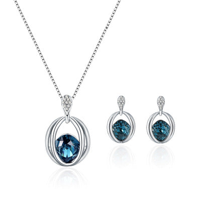 A Maramalive™ Modern Austrian Crystal Jewelry Set with a blue topaz stone