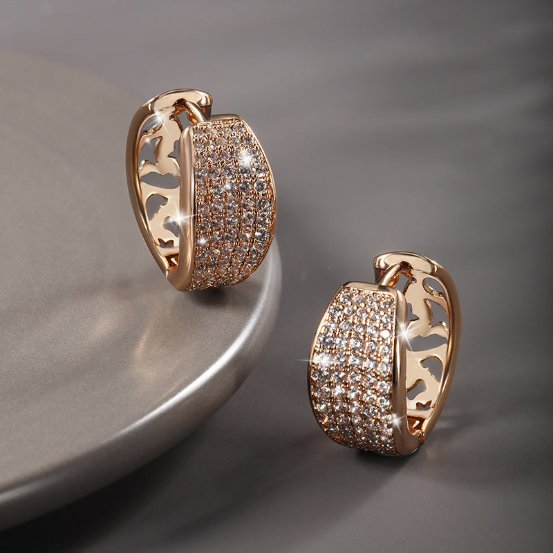 A pair of Women's Fashion Exaggerated Temperamental Earrings by Maramalive™ with diamonds.