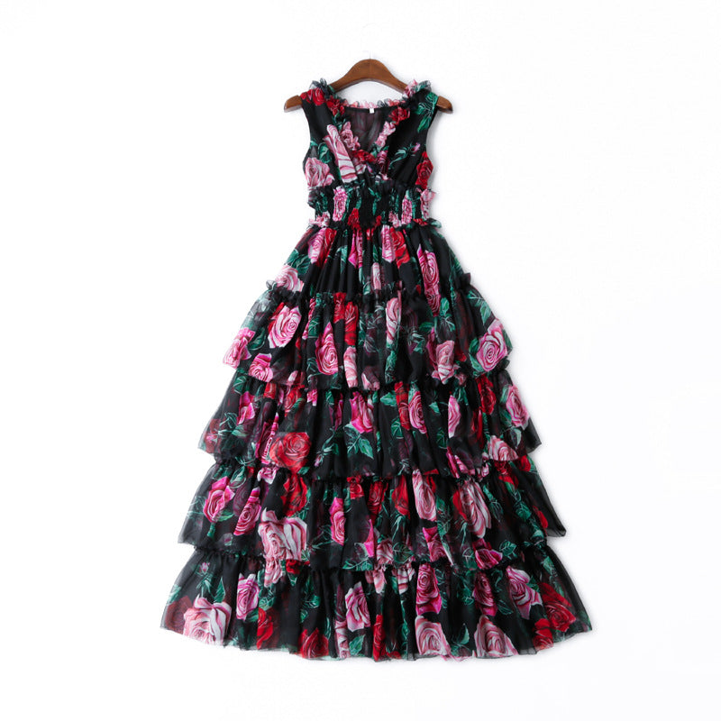 A black and pink Rose print princess dress by Maramalive™ hangs on a hanger.