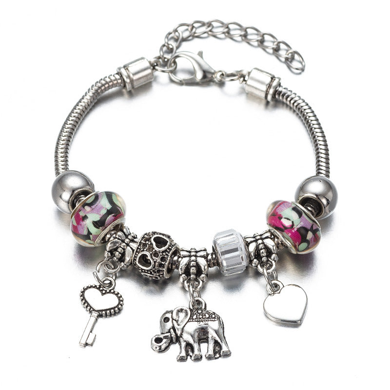 A set of Elephant Charm Bracelets with different charms and charms by Maramalive™.