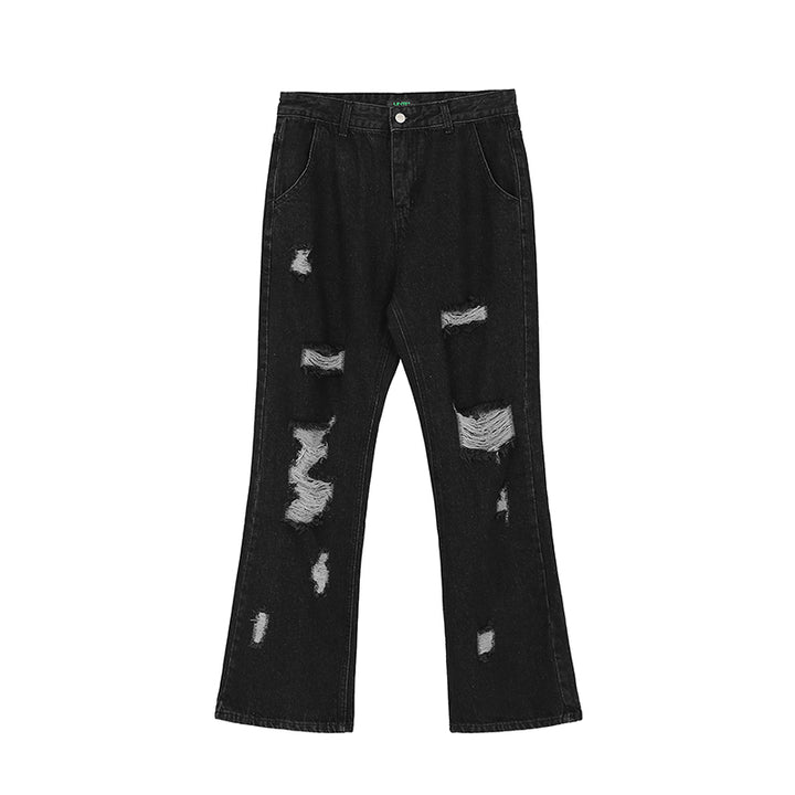 A man in Maramalive™ Hip Hop Vibe Back Gothic Alphabet Embroidery Ripped Micro Flared Denim Pants.