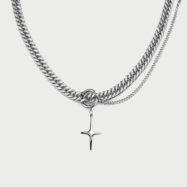 A man wearing a Maramalive™ Shine Bright Like a Diamond (Star) Pendant Wide Hip Hop Titanium Steel Necklace.