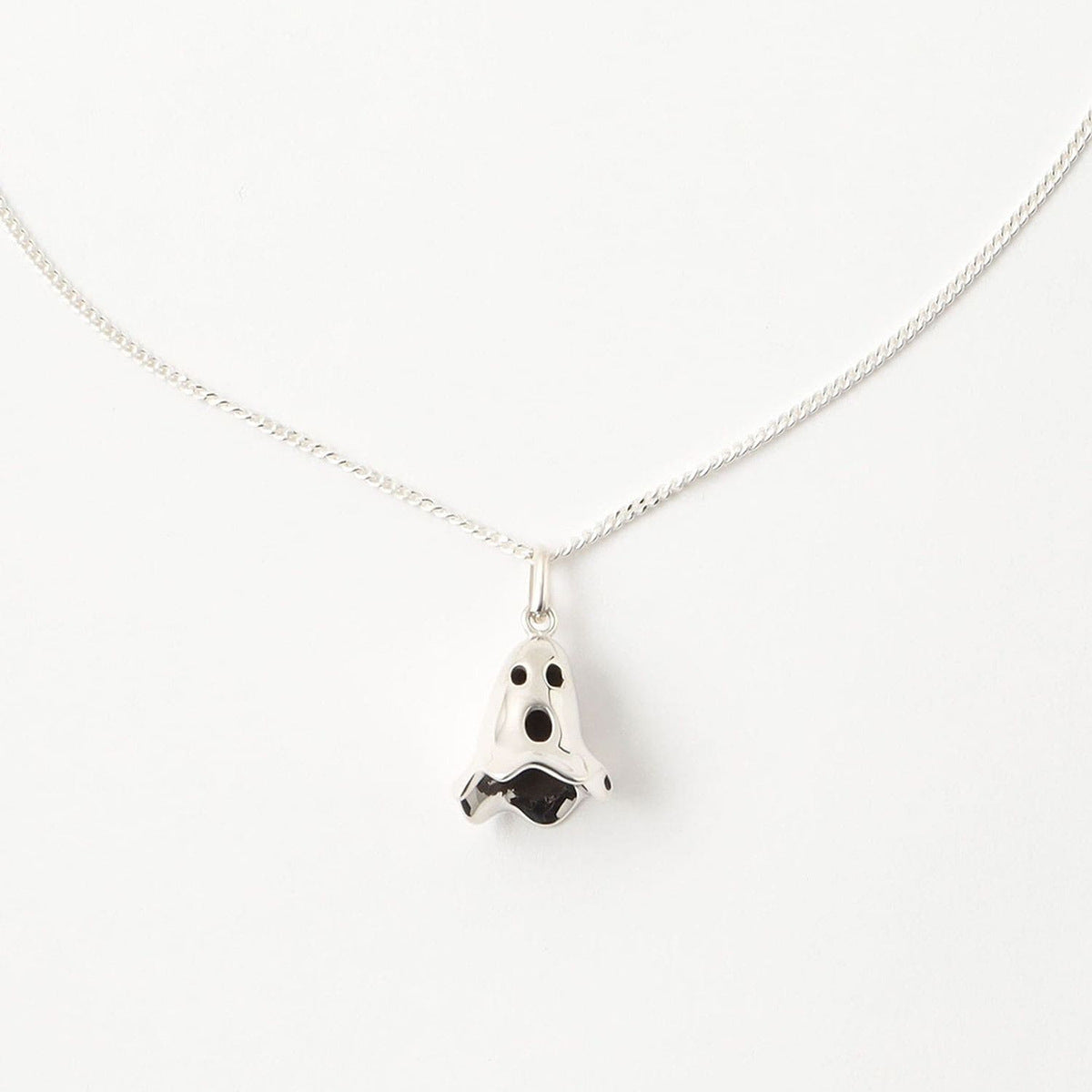 A Halloween Cartoon Ghost Pendant Necklace on a chain by Maramalive™.