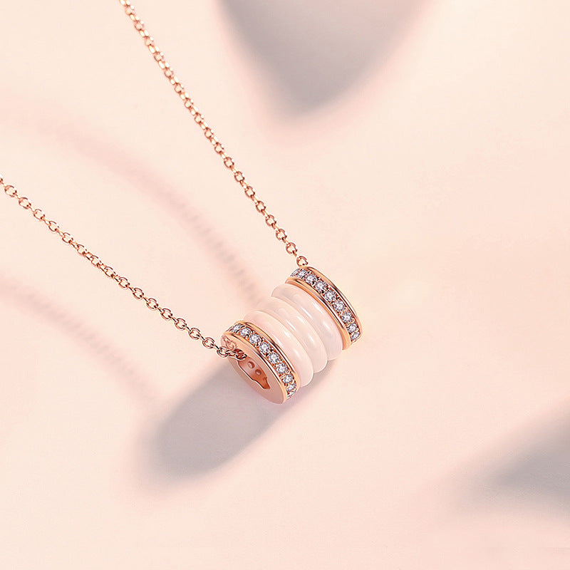 A woman is wearing the Maramalive™ Ferris Wheel Small Waist Necklace For Women All-match with a pink stone.
