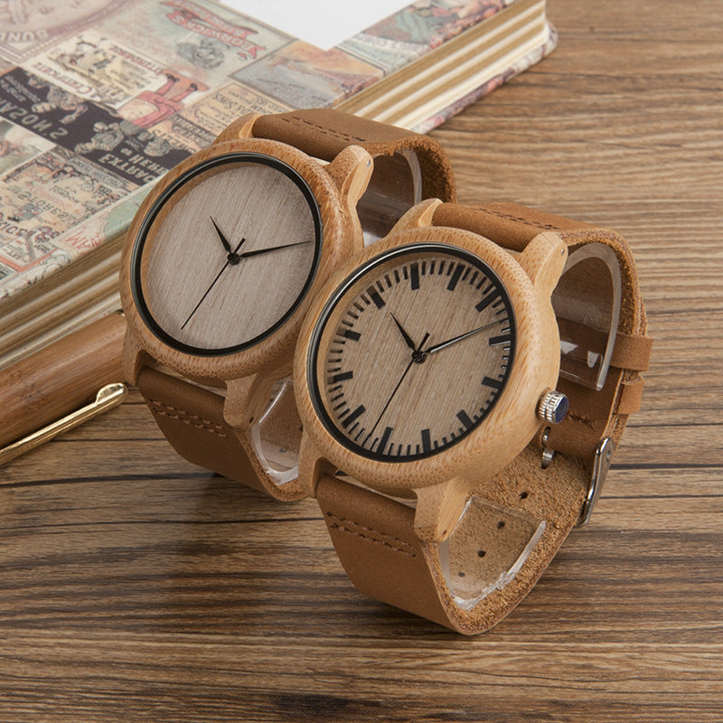 A Bamboo Wooden Watch by Maramalive™ in a box with a pink rose.